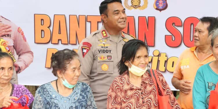 Bantuan Sosial Polres Bartim di Desa Haringen mendapat respon positif.