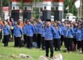 Jajaran ASN mengikuti Upacara HUT ke-54 KORPRI, HUT ke-80 PGRI, dan HKN ke-61 di Halaman Kantor Bupati Bartim, Senin (1/12/2025).