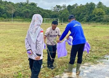 Jajaran Rutan Tamiang Layang dan instansi Pemkab Barito Timur membersihkan stadion magantis, Rabu (4/2/2026). (Ist Humas Rutan)