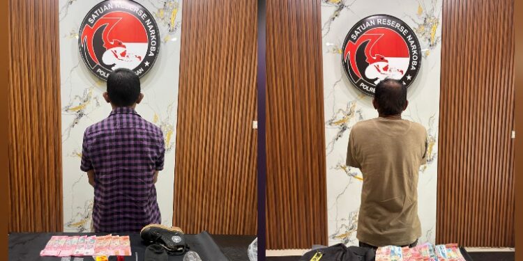 JU (57) dan AS (40) yang telah diamankan beserta barang bukti.