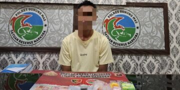 MM (37) dan barang bukti.