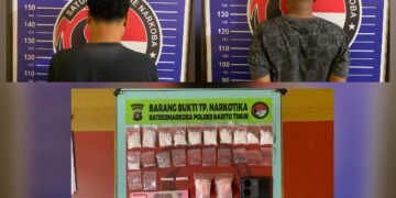 Kedua tersangka AR (38) dan SA (36), serta barang bukti.