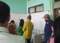 Anggota Reskrim Polres Gunung Mas sedang menangani dugaan persetubuhan anak dibawah umur. (Ist Satreskrim Polres Gunung Mas).