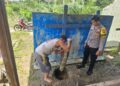 Polisi yang melakukan olah TKP dugaan pembongkaran makam di Desa Lebo, Rabu (24/6/2026). (Ist)