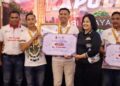 IPDA Desta A dan Brigpol M. Azmi Aziz, ketika menerima piagam dan hadiah sebagai juara, Rabu (24/6/2026). (Ist)
