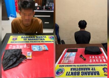 FA (39) dan M (38) beserta barang bukti.