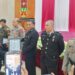 Ketua DPRD Kabupaten Murung Raya, Rumiadi, menyerahkan penghargaan pada momen Hari Bhayangkara ke-80.