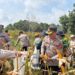 Wakalpores Barsel Kompol Muh. Fadholin, diikuti oleh sejumlah Pejabat Utama (PJU) Polres Barito Selatan, Kapolsek Dusun Selatan beserta personel saat panen Jagung komposit di Desa Mangaris.