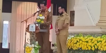 Bupati Barito Timur M. Yamin bersama Wakil Bupati Barito Timur Adi Mula Nakalelu, ketika menyampaikan sambutan di Musda VI Golkar Barito Timur, di GPU Mantawara Tamiang Layang, Senin (24/8/2026).