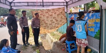 Pembuatan mural yang dilakukan jajaran Satlantas Polres Bartim di momen HUT ke-71 Lalu Lintas, Selasa (15/9/2026).
