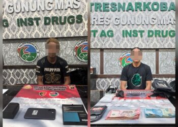 Tersangka RA (23) dan EM (32) beserta barang bukti.