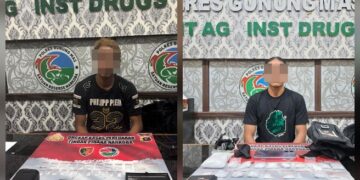 Tersangka RA (23) dan EM (32) beserta barang bukti.