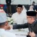 Bupati Barito Utara, H. Shalahuddin, menyaksikan pernikahan Azizah Dwi Suci, S.T., M.T., dengan Muhammad Munawar Fadilah, S.T., di Gedung Balai Antang Muara Teweh, Senin (31/8/2026).