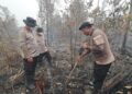 Kapolresta Palangka Raya, Kombes Pol Andiyatna, S.I.K., M.H. dan Dir Samapta Polda Kalteng Kombes Pol. Viddy Dasmasela, S.H., S.I.K., M.M. dalam penyekatan kawasan lahan yang terbakar di Jalan Eka Hapakat, Jumat (25/9/2026). (ist)