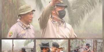 Kapolres Barito Timur AKBP Iqbal Sengaji bersama personel berjibaku padamkan api. (ist)